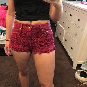 Red shorts with lace detail